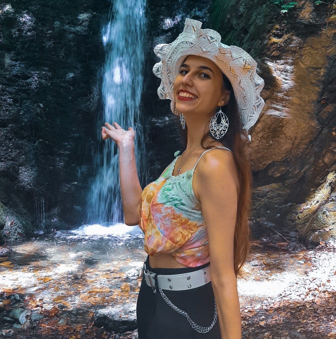 Evgenija Jovanova standing in front of the Crnodolski waterfalls