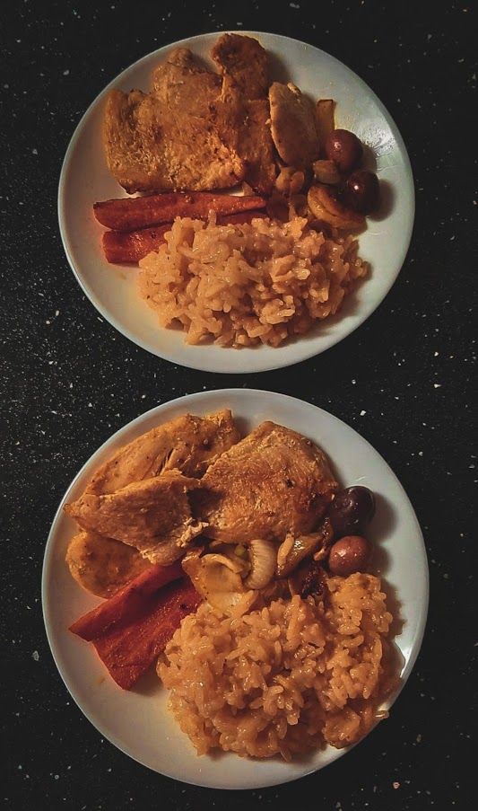 Two plates with nicely served dinner